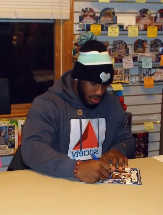 Jonas Gray signing autographs at P&T Sports Cards